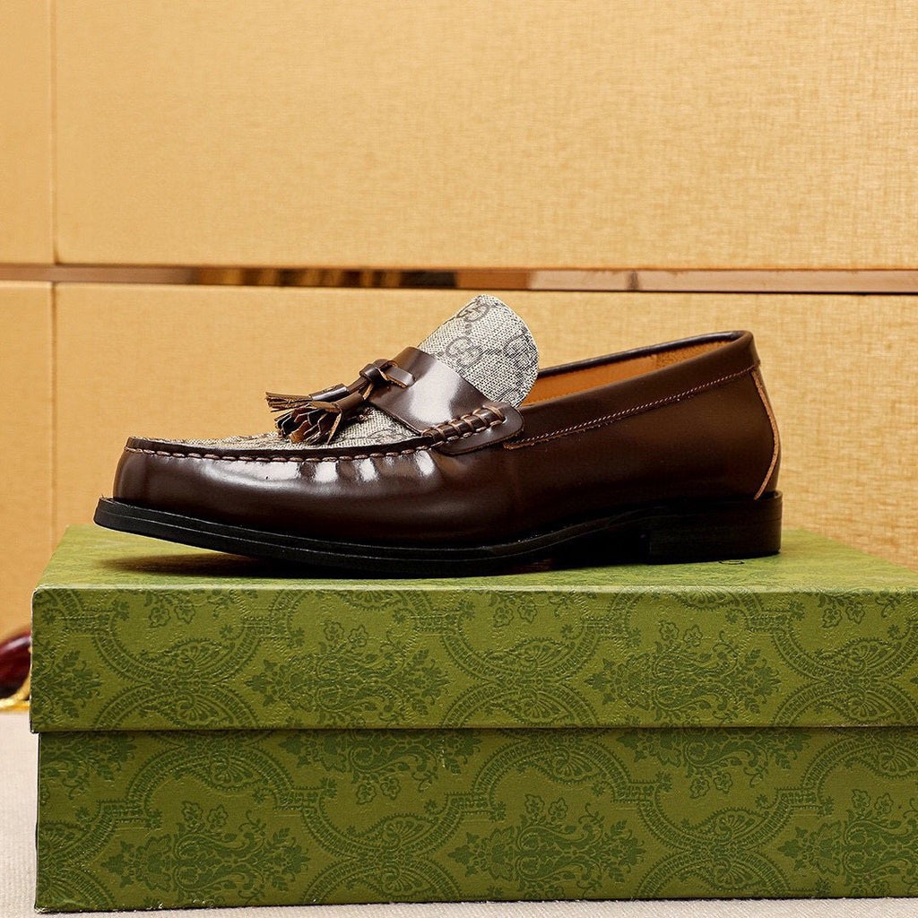 Gucci Tassel Monogram Loafers
